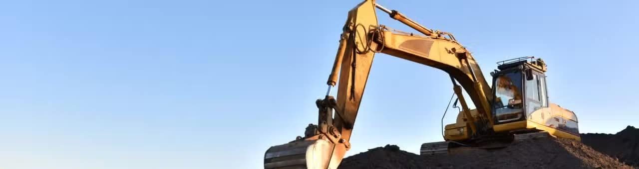 Noleggiare un escavatore cingolato o gommato?